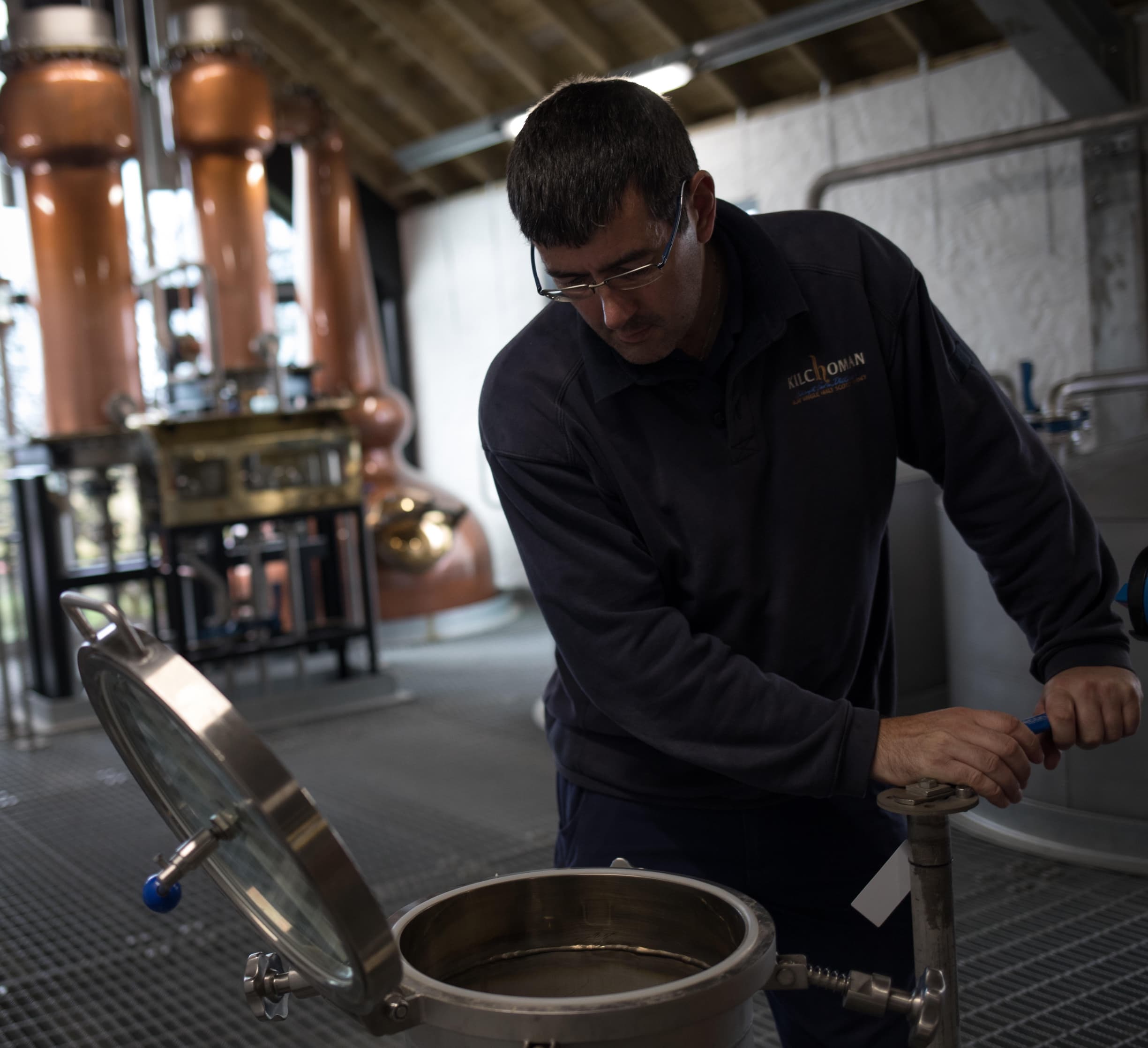 Man distilling